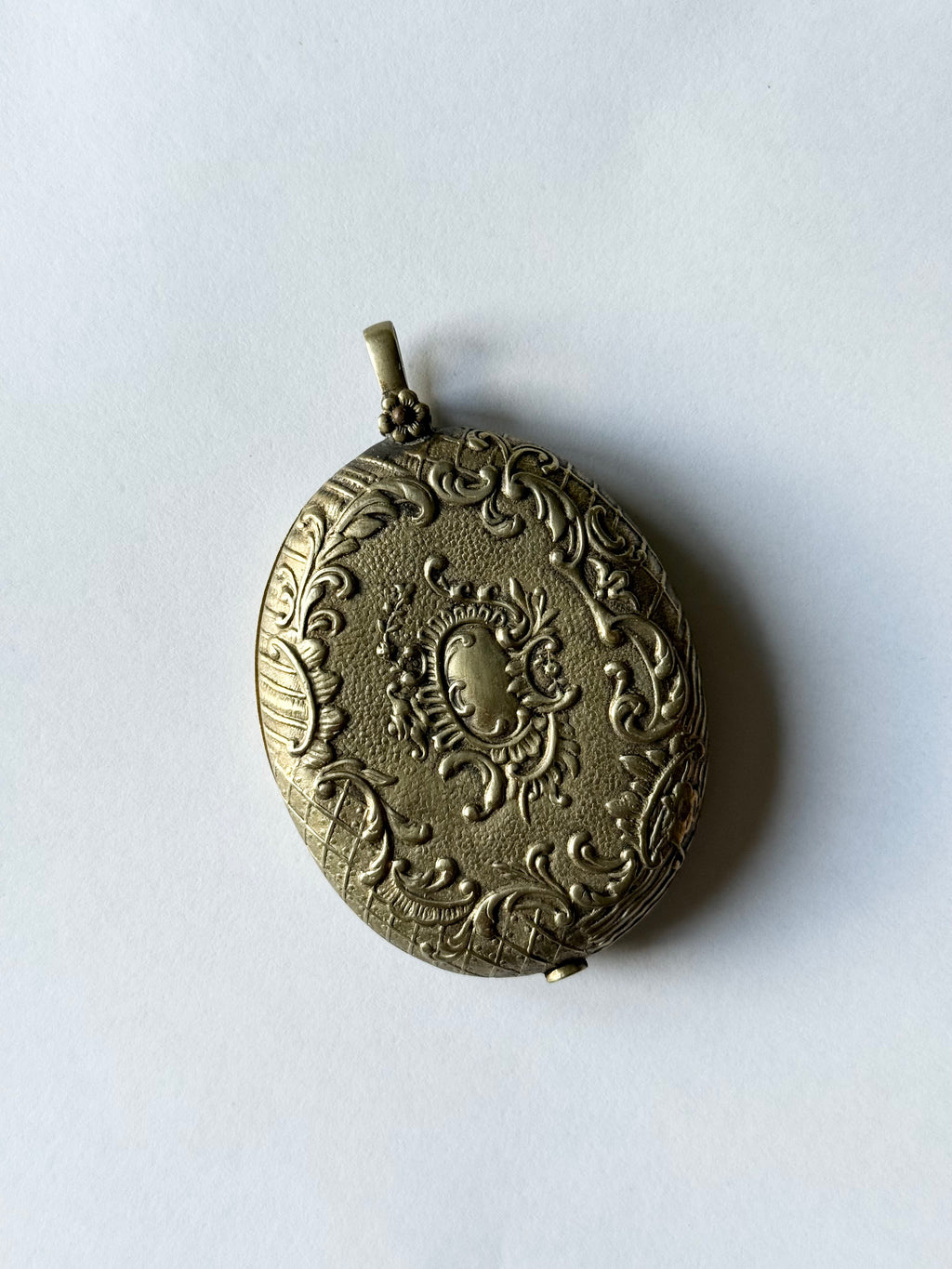 rare turn of the century French silver & brass repousse mirrored slide locket