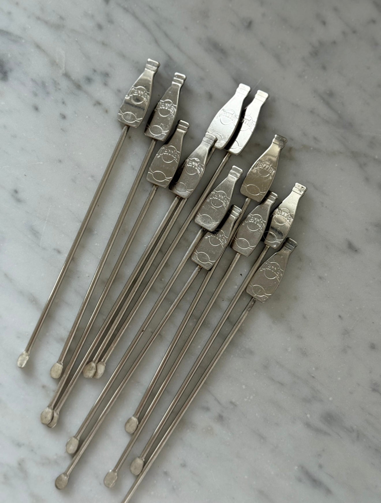 set of vintage 1970s French Perrier silver plate cocktail stirrers, set of 12