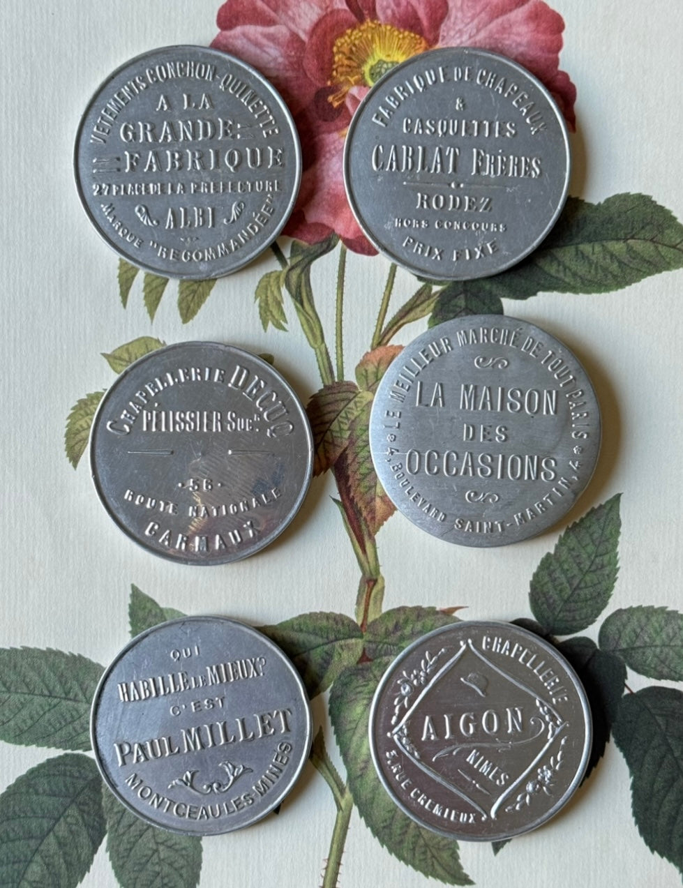 turn of the century French repousse aluminum advertising pocket mirrors