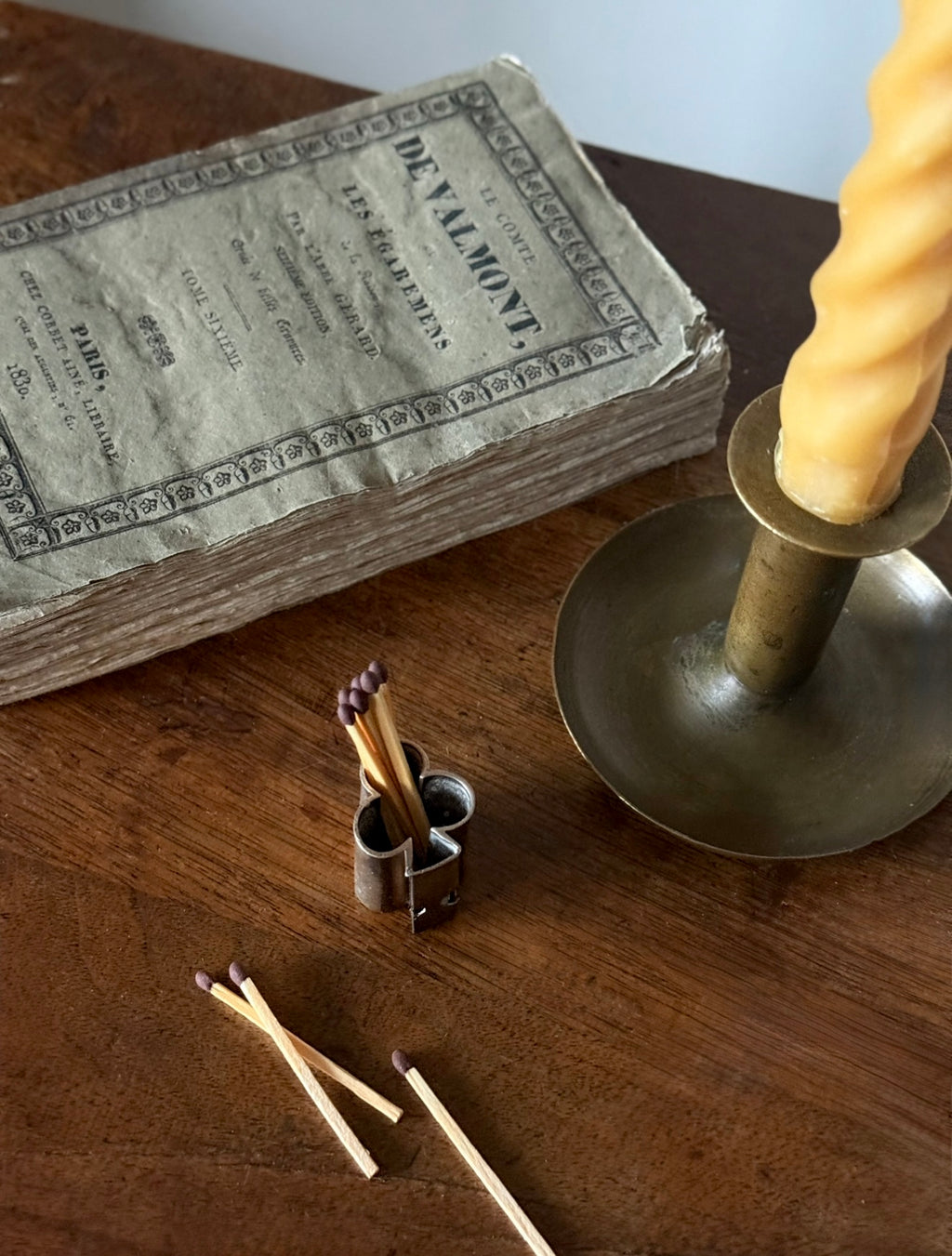 turn of the century French "trefoil" matchstick holder with striker