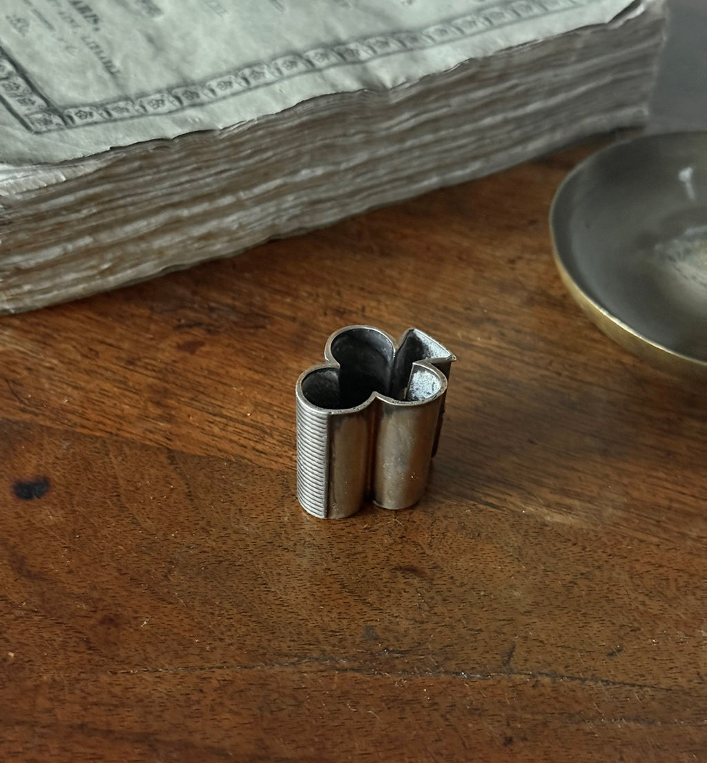 turn of the century French "trefoil" matchstick holder with striker