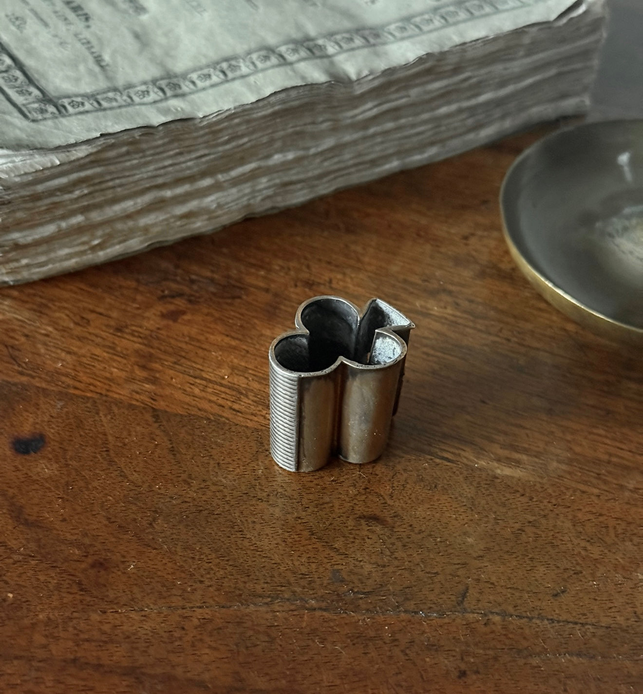 turn of the century French "trefoil" matchstick holder with striker