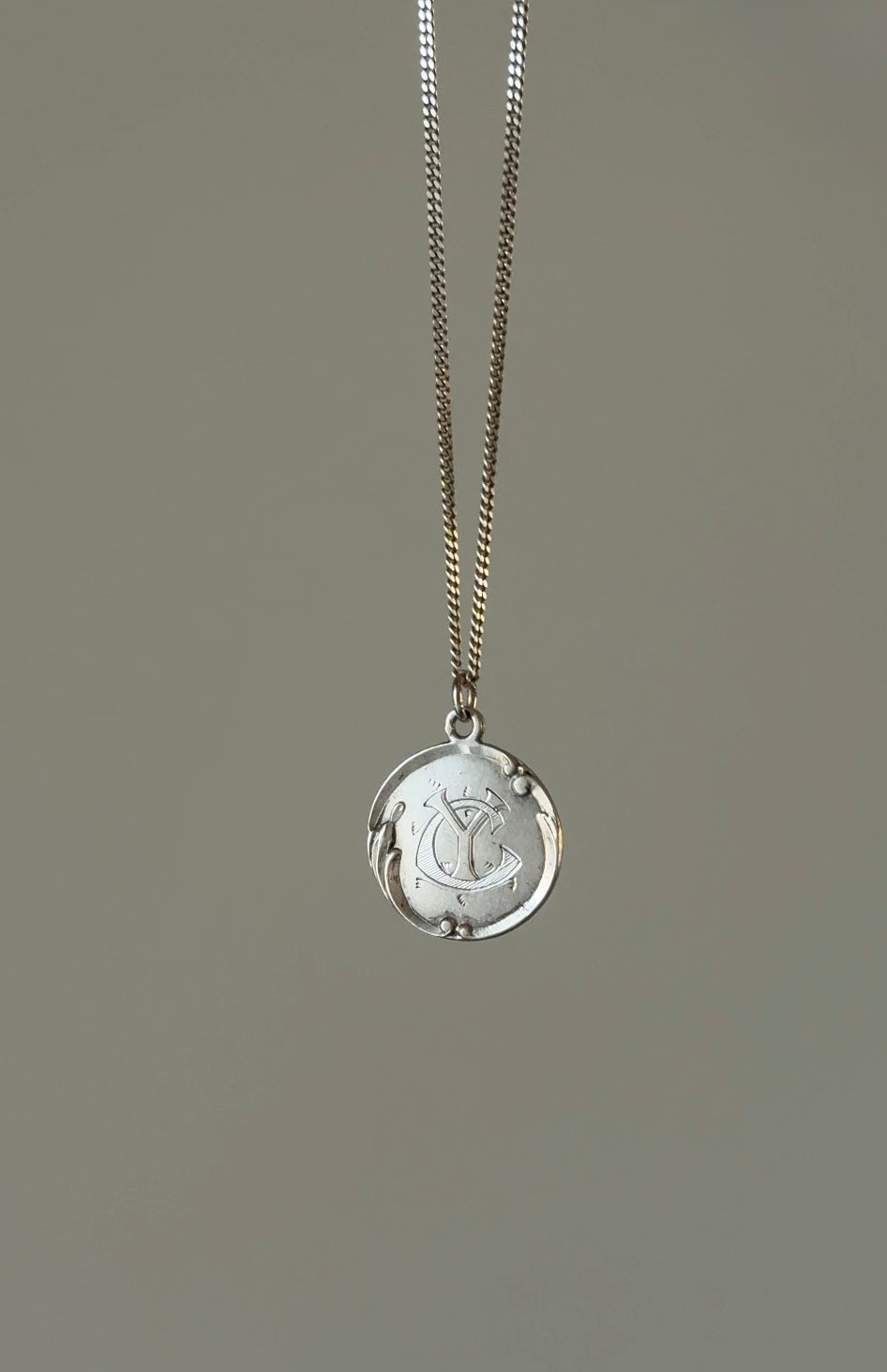 turn of the century French silver monogrammed medallion “CY”