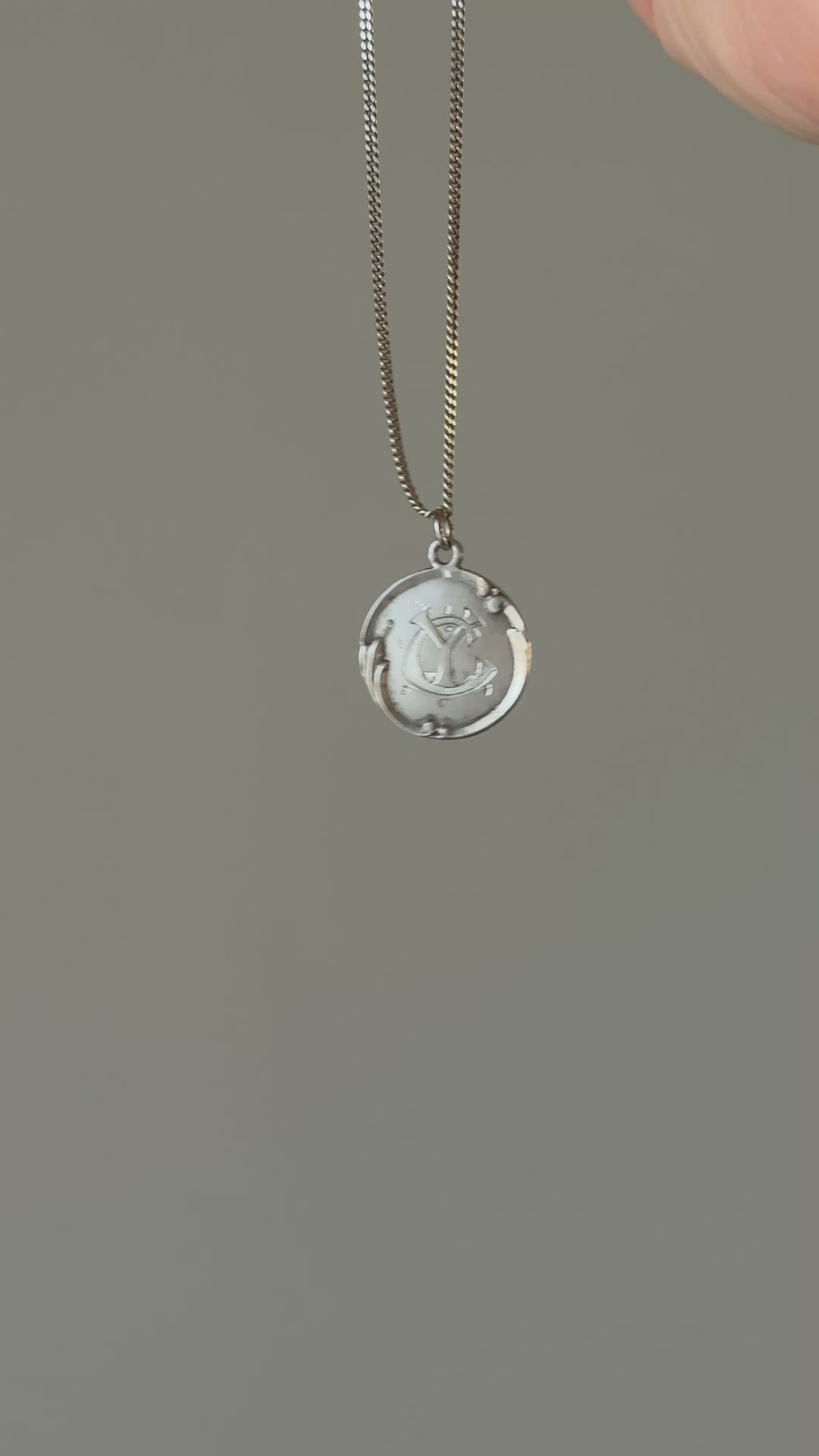 turn of the century French silver monogrammed medallion “CY”